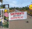 Manifestaciones sobre el puente del río San Juan en Urabá. FOTO: imagen tomada del portal Lea Noticias