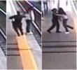 Momentos en los que la auxiliar de policía se abalanza contra una mujer y evita que se lance al a vía férrea del metro. FOTOS: Captura de video