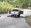 Así quedaron los cuerpos de las tres víctimas de la masacre registrada en la vía La Albania-Puerto Escondido, la cual da acceso al municipio de Titiribí, en el Suroeste antioqueño. FOTO: CORTESÍA