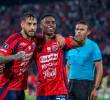 El polaco Francisco Fydriszewski junto a Jhon Montaño celebran el gol con el que el DIM venció a Cusco en el Atanasio Girardot. FOTO MANUEL SALDARRIAGA