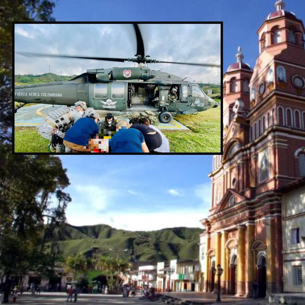 Adelante, el momento del rescate con el helicóptero Ángel de la FAC. Atrás, casco urbano de Anorí. Foto: Jaime Pérez Munévar