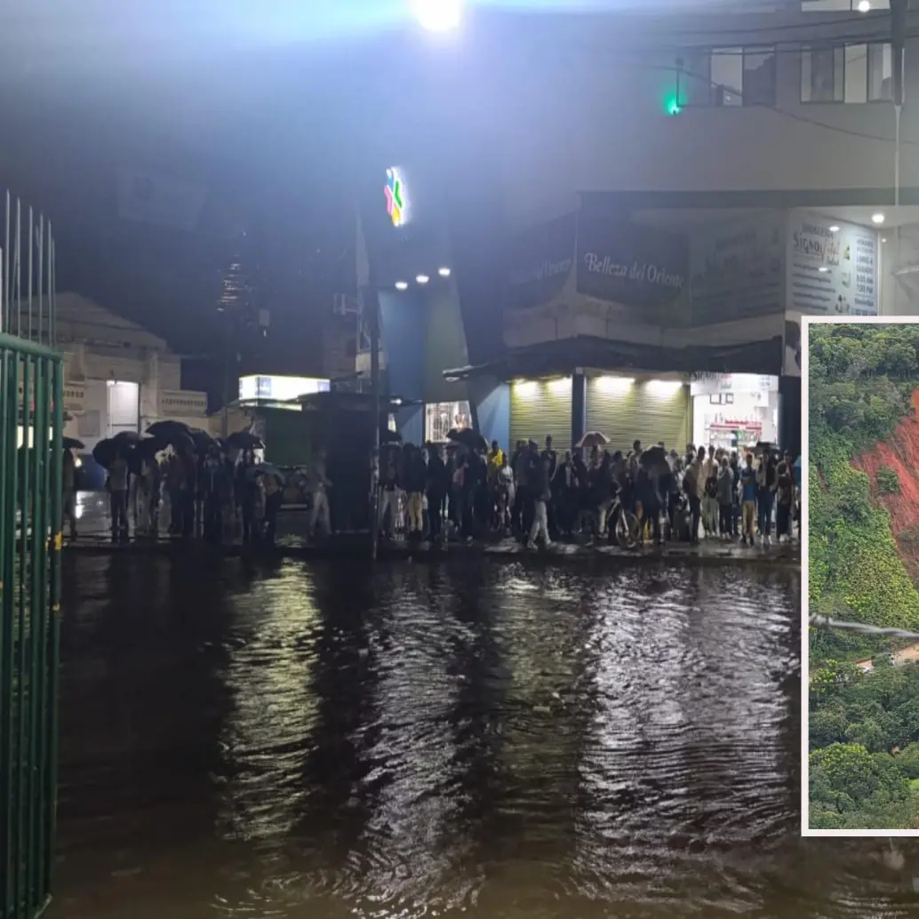 Adelante, uno de los deslizamientos en el Nordeste. Atrás, el centro del municipio de Rionegro inundado a raíz de las fuertes lluvias de ayer martes. FOTO: Cortesía e imagen tomada de redes.
