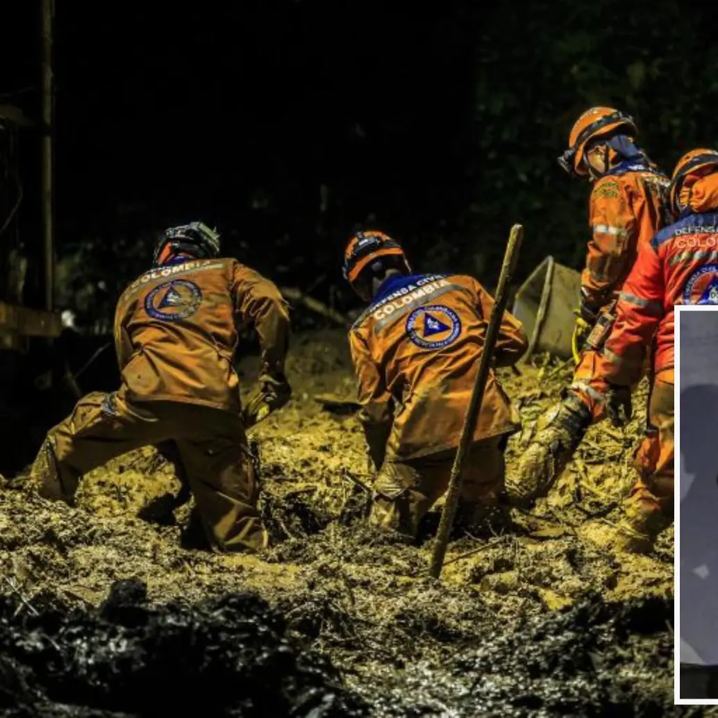 Adelante, uno de los vecinos de San Isidro en Sabaneta junto a una gatica que se salvó de la avalancha. Atrás, miembros de la Defensa Civil durante las labores de búsqueda. Fotos: Andrés Camilo Suárez Echeverry