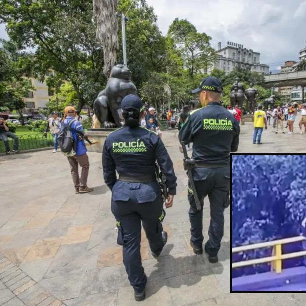 Adelante, momentos del rescate realizado por policías de Medellín. Atrás, un cudrante patrullando el Parque de Botero. Foto: Esneyder Gutiérrez
