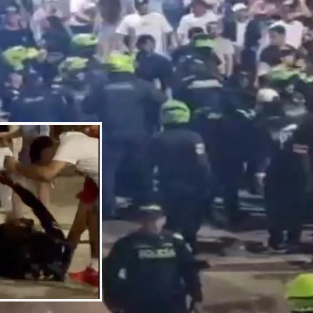 Adelante, el forcejeo en el que se habría accionado un arma de dotación. Atrás, la Policía enfrenta a los desadaptados. FOTO: Cortesía