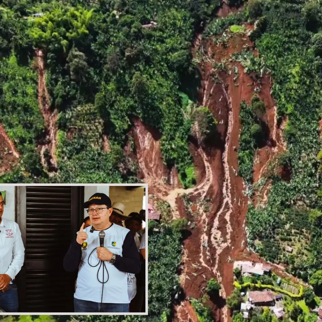 Adelante, el alcalde de Pueblorrico junto al director del Dagran. Atrás, la magnitud del deslizamiento. FOTO: imágenes tomada de redes