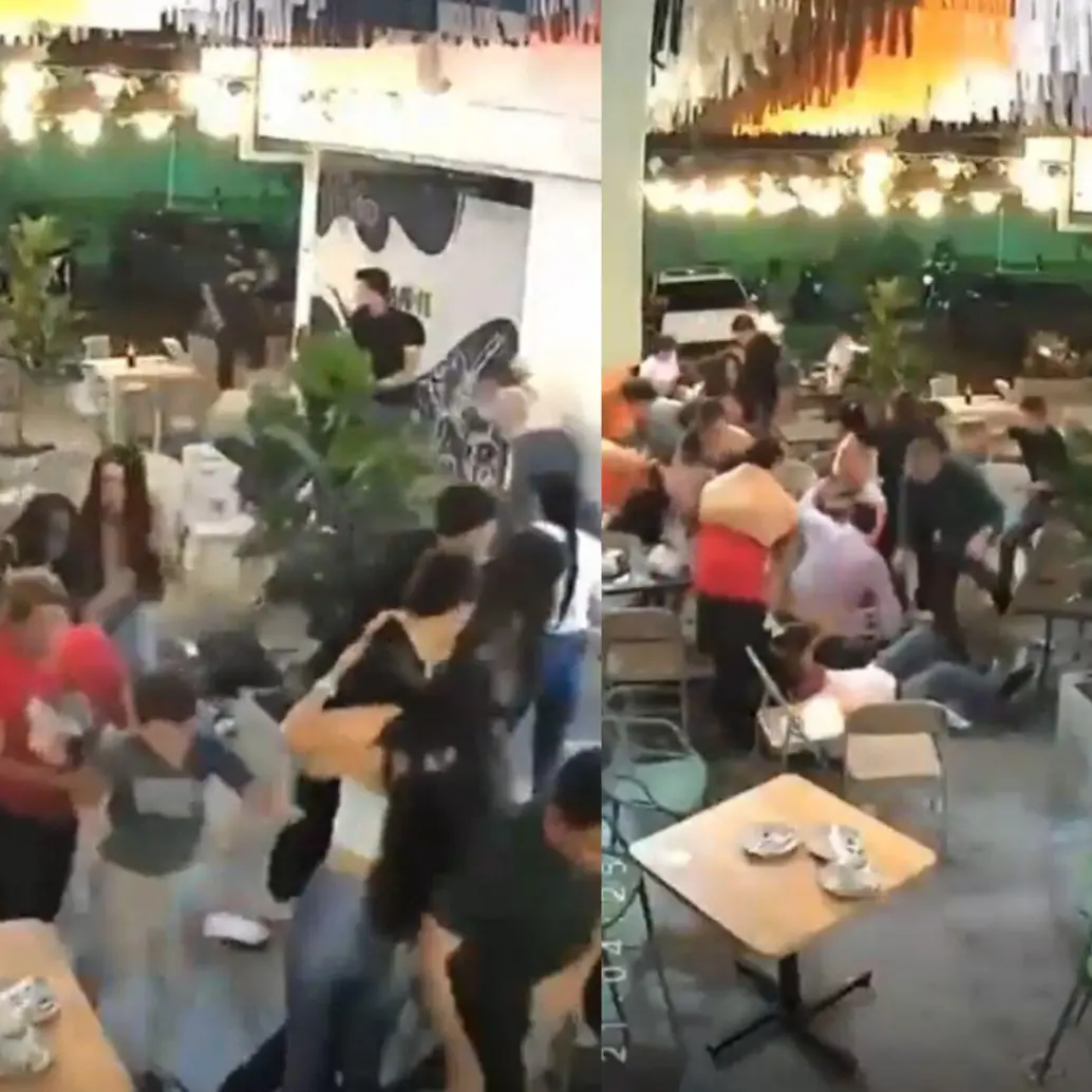 Ciudadanos salieron corriendo de un restaurante luego de percibir las detonaciones cerca al Batallón Agustín Codazzi, en Palmira, Valle. Foto: Captura de video redes sociales 