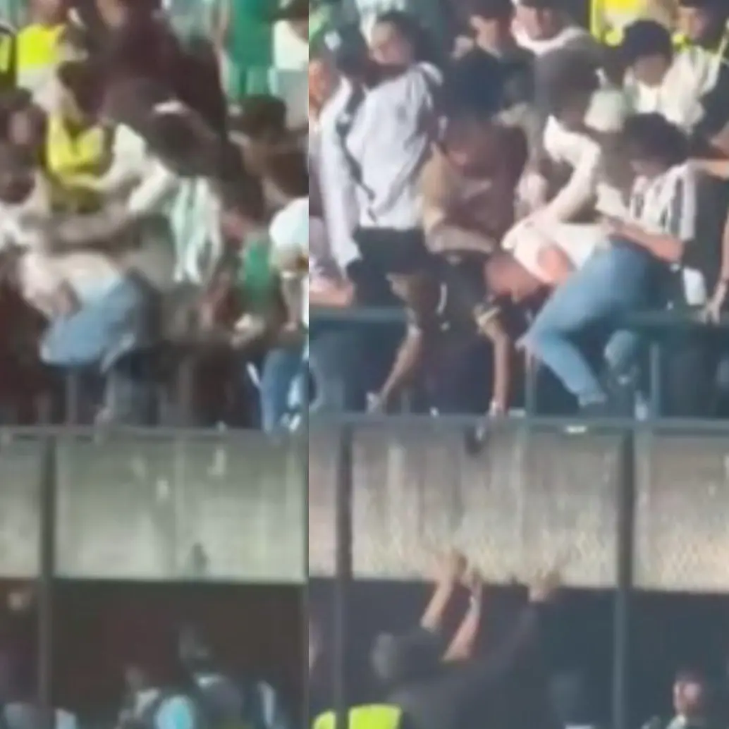 Un hincha cayó de las gradas a la pista atlética del estadio Ditaires tras ser golpeado por seguidores del Nacional. Foto: Captura videos redes sociales