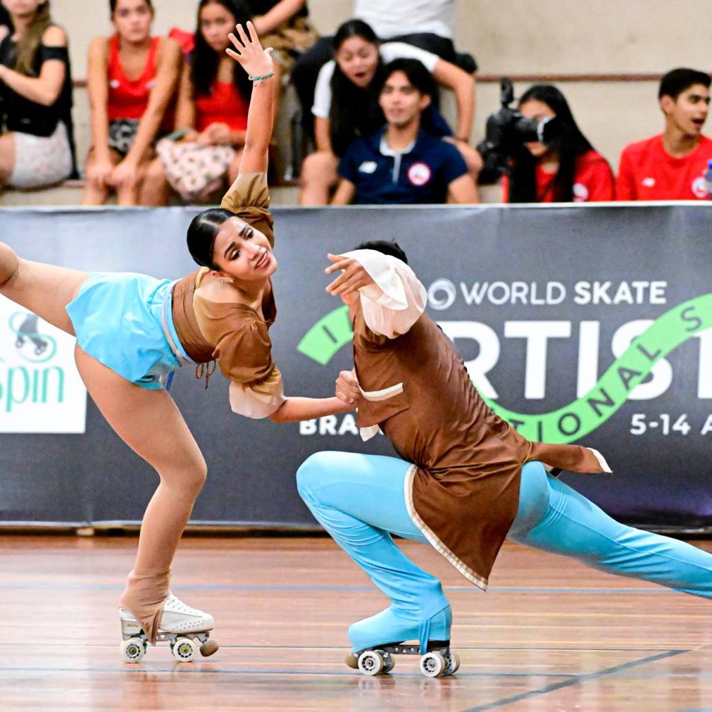 Jeshua Folleco y María Paula Muñoz, del Valle del Cauca, ganaron oro en la modalidad de danza júnior en Brasil. FOTO<b><span class="mln_uppercase_mln"> cortesía fedepatÍn </span></b>