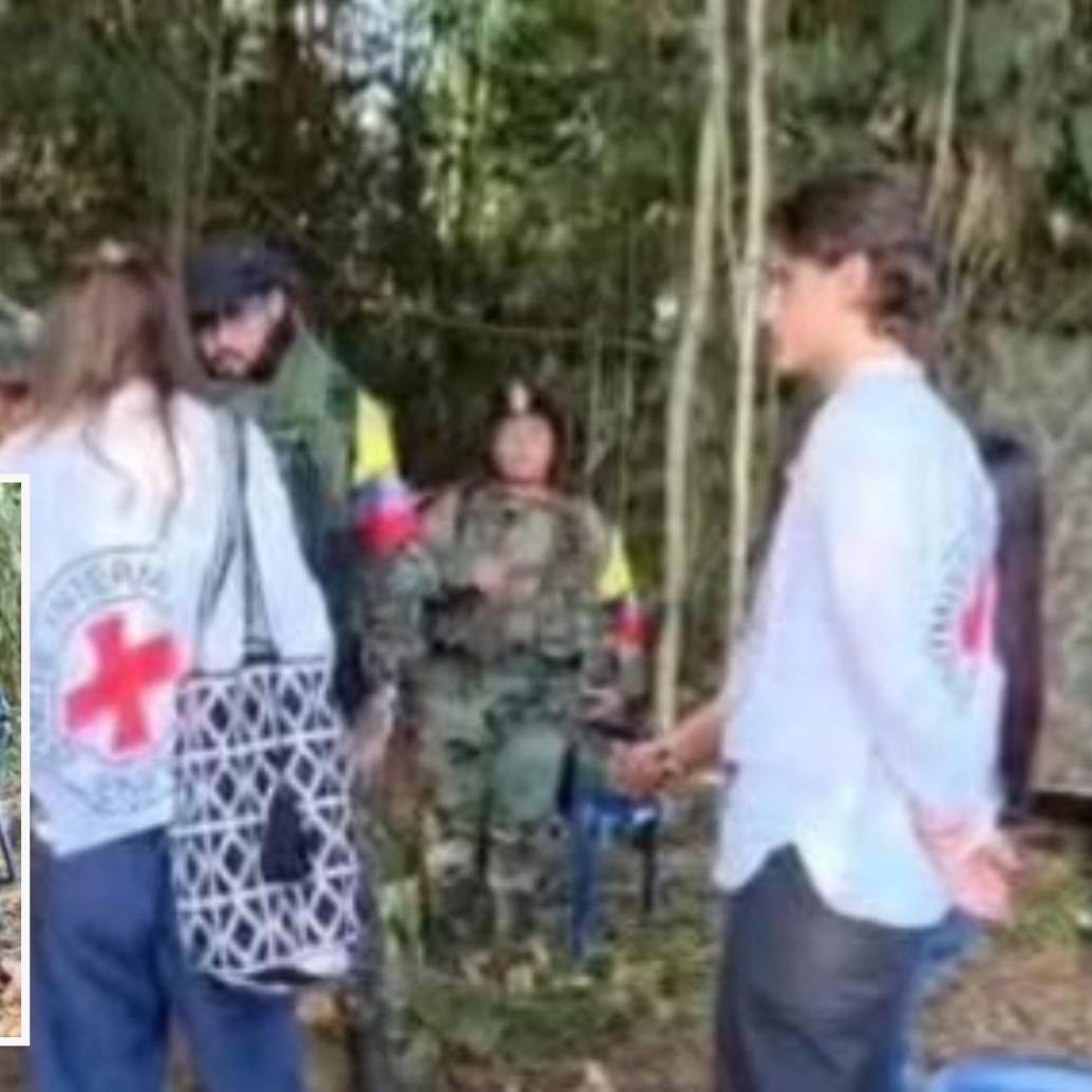 Adelante, las dos niñas secuestradas durante su liberación. Atrás, los miembros del CICR. FOTO: imagen tomada de redes.