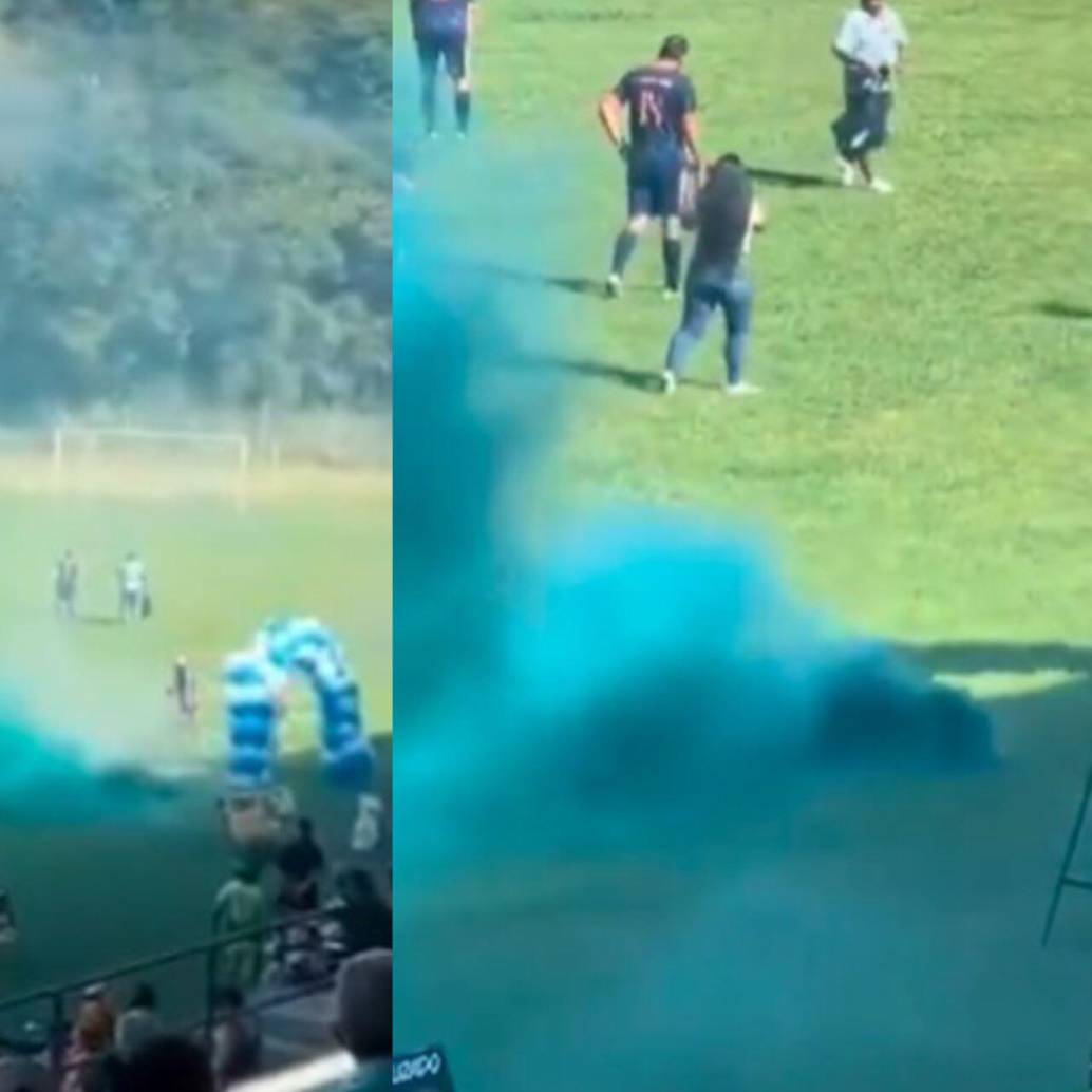 En medio de los actos protocolarios de un partido de fútbol, personas encendieron un artefacto pensando que eran bengalas y resultó gas lacrimógeno. Foto: Captura de video