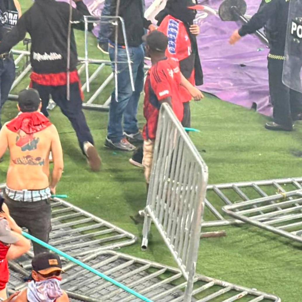 Estos fueron algunos de las hechos que se vivieron al final del compromiso entre DIM y Nacional, que dejó como campeón al verde paisa. FOTO: Cortesía