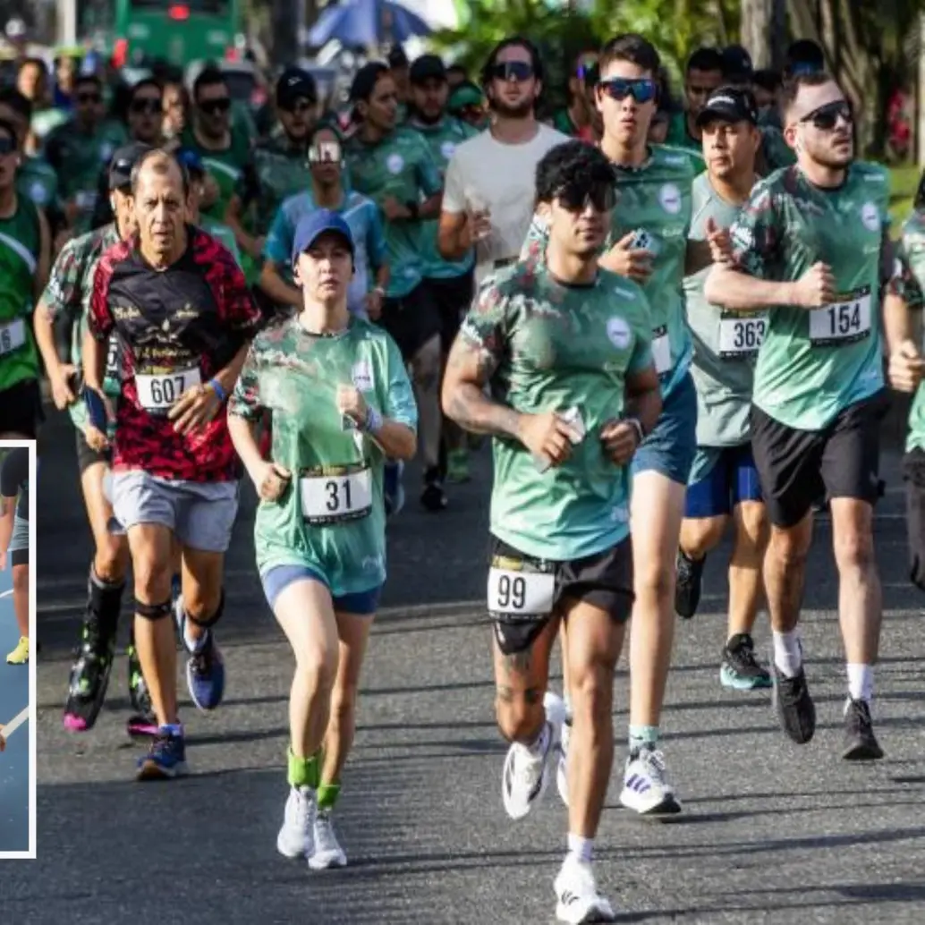 Adelante, algunos de los animales que se han beneficiado de la iniciativa. Atrás, participantes de una carrera atlética de la ciudad. Foto: Julio César Herrera Echeverri.