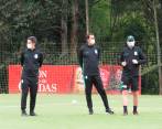 Alexandre Guimaraes (centro) fue el primer técnico brasileño en ganar un título en Colombia (América-2019). FOTO cortesía Nacional