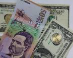 El dólar se negoció en promedio hoy en la bolsa a $4.306,96. FOTO Manuel Saldarriaga