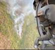 Las labores para controlar los incendios en Antioquia cuentan con apoyo aéreo de la Fuerza Aérea Colombiana. Dos helicópteros participaron en las operaciones. Foto: Cortesía.
