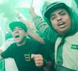 Los hinchas del verde mostraron su respaldo a los dirigidos por Diego Arias antes de emprender el viaje a Barranquilla y en la Arenosa con el banderazo. FOTO TOMADA X@nacionaloficial