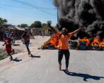 Las manifestaciones llegaron a las calles y se tornaron violentas. Policías exigen garantías en Haití para hacer cumplir la ley. FOTO AFP