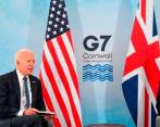 El presidente Joe Biden (der.) convenció a Boris Johnson y el resto de líderes del G7 para lanzar un plan que contrarreste el avance de los últimos meses por parte de China. FOTO EFE