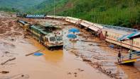 En India, las lluvias causaron un deslizamiento de tierra que afectó una estación del tren Foto: AFP