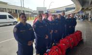 Estos fueron los ocho bomberos de Envigado que viajaron a Venezuela para apoyar las labores de búsqueda y rescate en la emergencia. FOTO: CORTESÍA BOMBEROS DE ENVIGADO