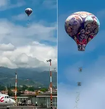 El globo apareció en el horizonte y terminó cayendo sobre el área de la pista del aeropuerto Olaya Herrera de Medellín. FOTOS: Captura de video