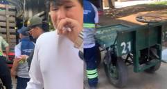 El joven llorando y sollozando intenta explicar en pocas palabras que solo estaba trabajando y que por favor no se lleven la carreta las autoridades. FOTO: Cortesía redes sociales