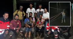 Este es el momento exacto donde de la mano de los organismos de socorro, la madre por fin cruzó el río con sus hijos. FOTO: Cortesía Gobernación de Antioquia