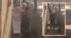 En un video difundido por redes sociales se conoció como un joven maltrata a una adulta mayor con un ventilador por no darle dinero en un callejón de Medellín. FOTO: TOMADA DE VIDEO
