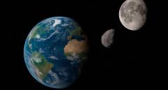 Ilustración artística del planeta Tierra junto a su luna y el asteroide 2025 PN7, un cuasi-satélite que seguirá acompañando nuestra órbita hasta el año 2083. FOTO creada con inteligencia artificial 