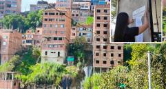 Adelante, una funcionaria realizando un sellamiento. Atrás,algunas de las viviendas investigadas. FOTO: Cortesía