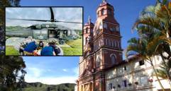 Adelante, el momento del rescate con el helicóptero Ángel de la FAC. Atrás, casco urbano de Anorí. Foto: Jaime Pérez Munévar