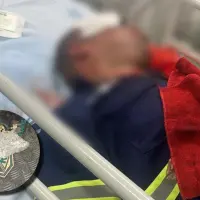Así quedó el conductor de la grúa tras recibir el impacto de la piedra. FOTOS Alcaldía de Medellín.