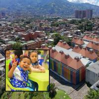 Adelante, uno de los niños beneficiarios. Atrás ,uno de los CDI en Itagüí. FOTO: Cortesía
