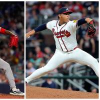 Tayron Guerrero (izquierda, Boston Red Sox) y Didier Fuentes (derecha, Atlanta Braves) representan a Colombia en postemporada de las Grandes Ligas. FOTO GETTY