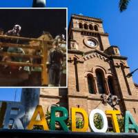 Adelante, momentos del rescate por parte de conductores y vecinos. Atrás, parque de Girardota. Foto: Julio César Herrera Echeverri.