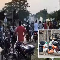 Adelante, basuras acumuladas en Caucasia. Atrás, un bloqueo en una de las vías. FOTO: imagen tomada de redes.