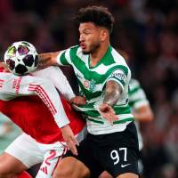 Arsenal se convirtió en el semifinalista de la Champions League al dejar en el camino al Sporting de Lisboa del colombiano Luis Javier Suárez. FOTO GETTY 