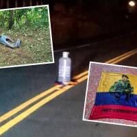 Este fue el cilindro que ubicaron en la mitad de la vía entre Dabeiba y Mutatá. También encontraron una bandera de las disidencias. FOTOS: CORTESÍA