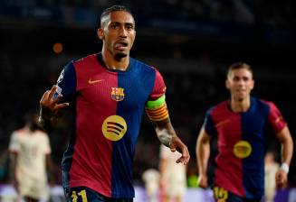 El brasileño Raphinha marcó triplete en la victoria del Barcelona, por la tercera fecha de la Champions League. FOTO GETTY 