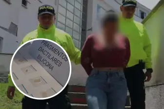 El destape de esta modalidad se dio con la detención de esta mujer en una notaría de Dosquebradas, al descubrirse que utilizaba documentos alterados y huellas dactilares sintéticas para traspasar predios ajenos. FOTO: Policía Nacional y cortesía