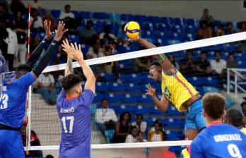 El antioqueño Miguel Ángel Martínez en acción, durante el juego ante Cuba que Colombia ganpo 3-2 para pasar a la final y disputar la medalla de oro de Juegos Centroamericanos. FOTO CORTESÍA Norceca