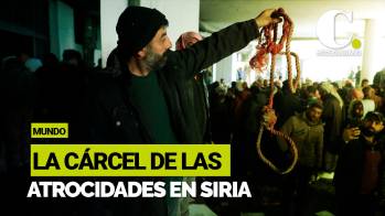 Rescatistas registran cárcel símbolo de la brutalidad del gobierno de Al Asad