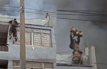 Sebastián Arias fue el héroe en Perú; escaló una fachada para rescatar a unos perros que estaban esperando por ser adoptados. Foto: captura de pantalla del video