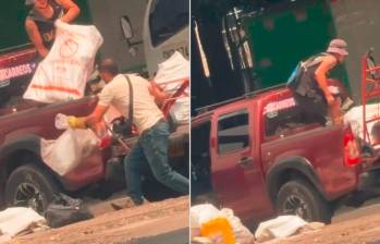 Estos fueron los momentos en los que quedaron captadas las dos personas tirando escombros en un separador de la avenida Guayabal. FOTO: CORTESÍA