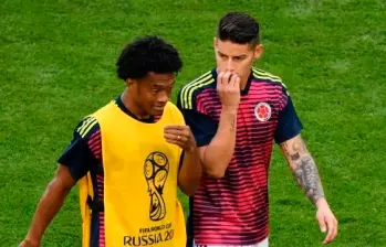 Juan Guillermo Cuadrado junto a James Rodríguez en la Selección Colombia. FOTO AFP