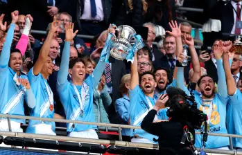 El festejo de los jugadores del Manchester City en Londres. FOTO GETTY