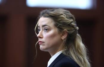 Amber Heard compartió una imagen de los pies de sus tres hijos para anunciar la llegada de Agnes y Ocean. FOTO AFP