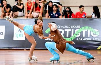Jeshua Folleco y María Paula Muñoz, del Valle del Cauca, ganaron oro en la modalidad de danza júnior en Brasil. FOTO cortesía fedepatÍn 