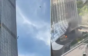 Restos de un avión ligero cayeron sobre la torre China Zun, en China. FOTOS: Capturas de video @visegrad24